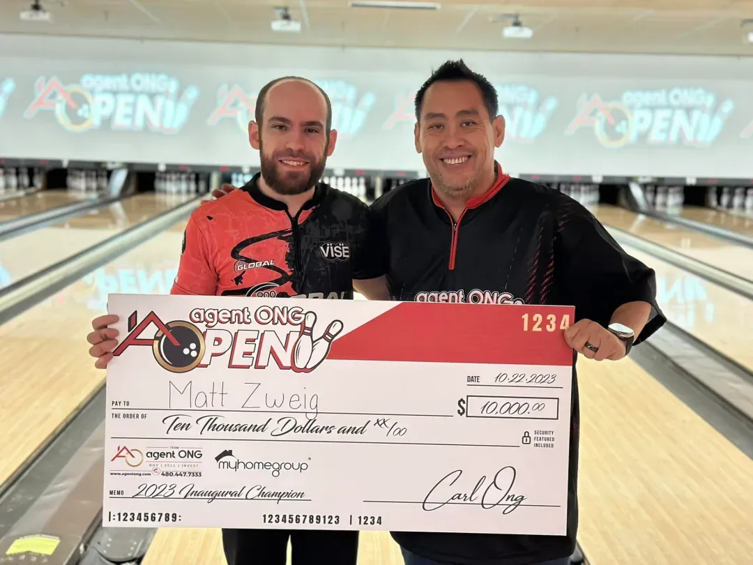 Matt Zweig accepting the inaugural Agent Ong Open trophy
